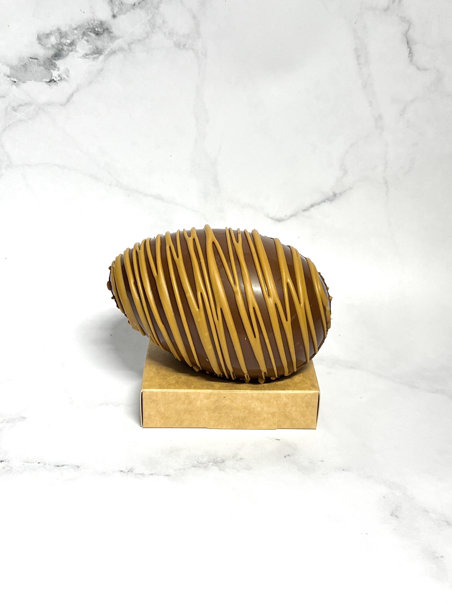 Oeuf Lait fourré praliné crunchy