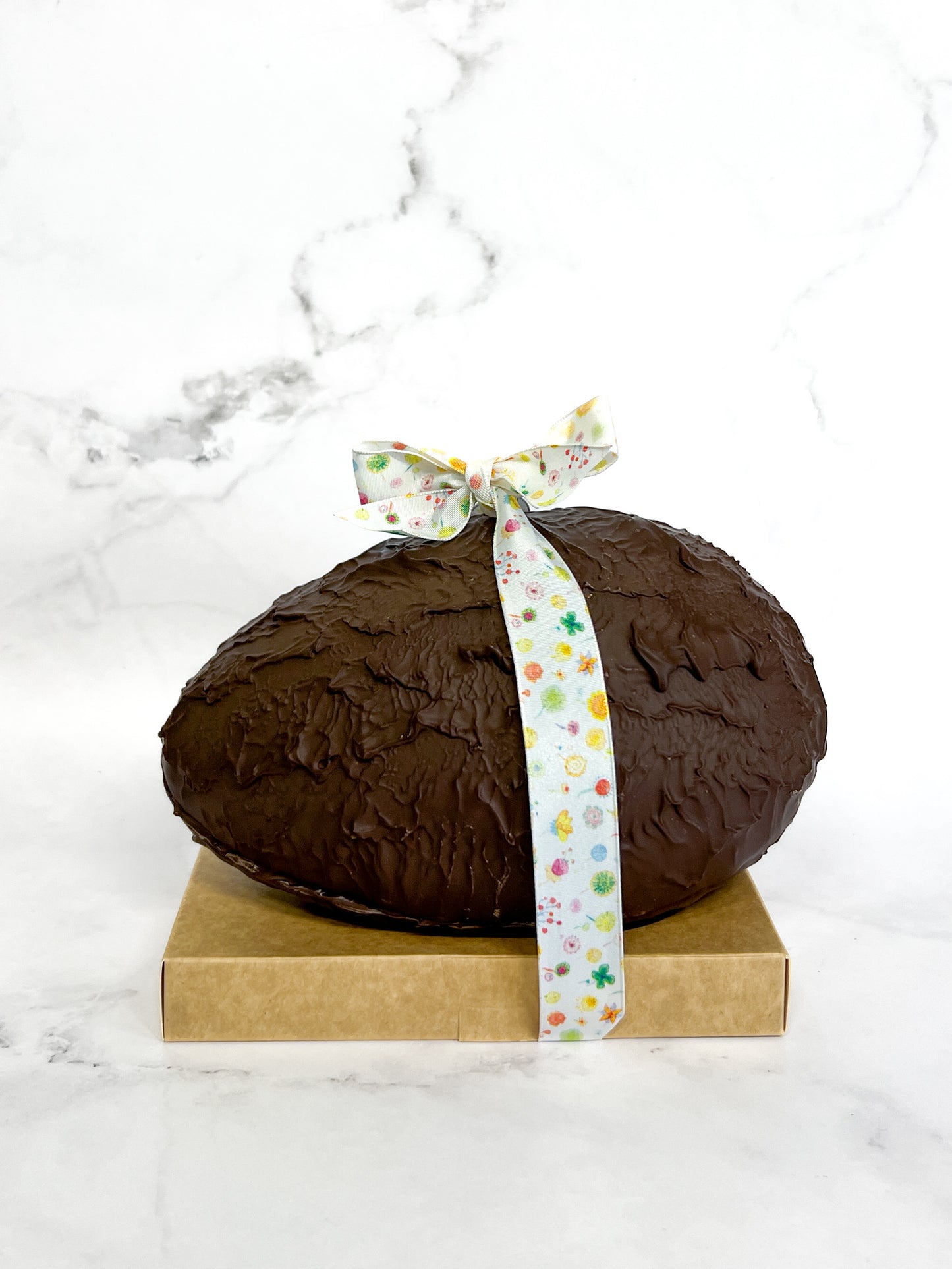 Grand Oeuf Noir Soufflé garni